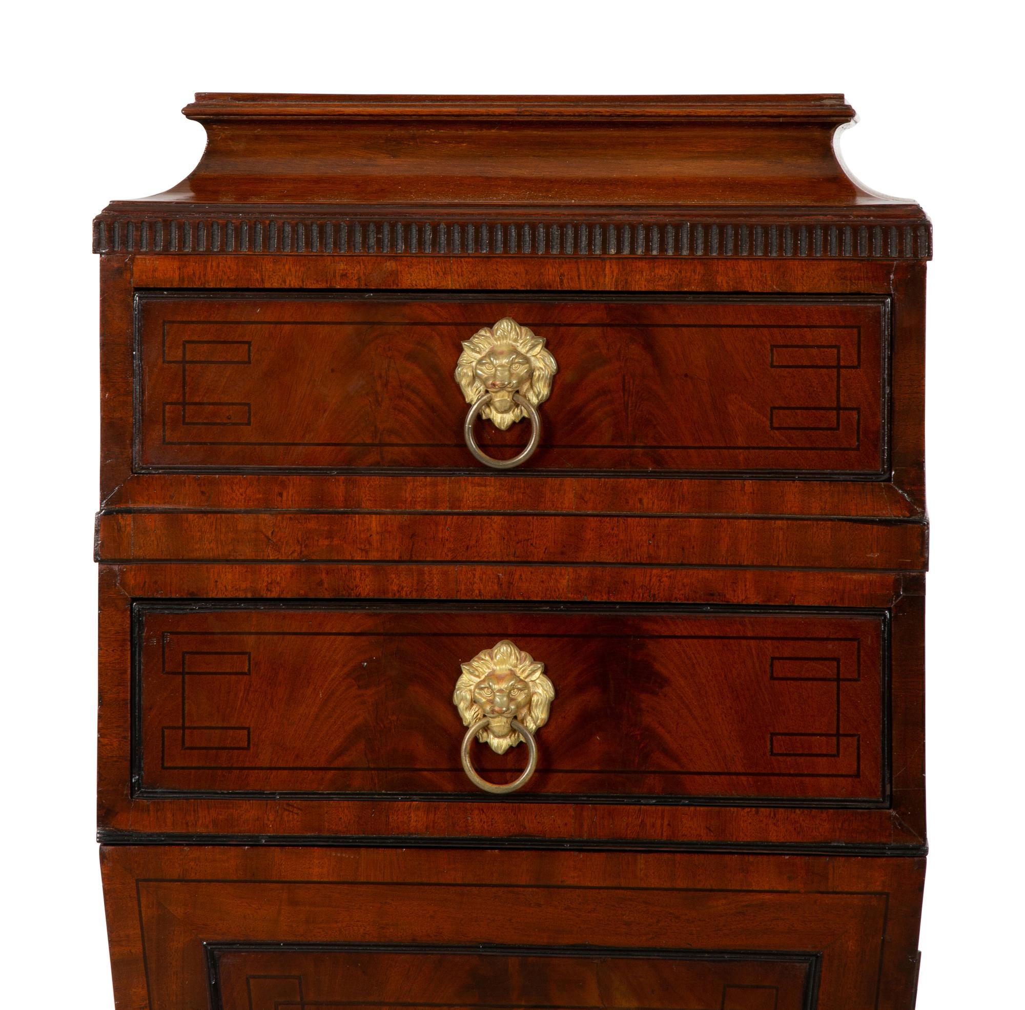 A Pair of Regency Mahogany Pedestal Cabinets