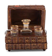 A French Musical Faux Book-Form Decanter Set