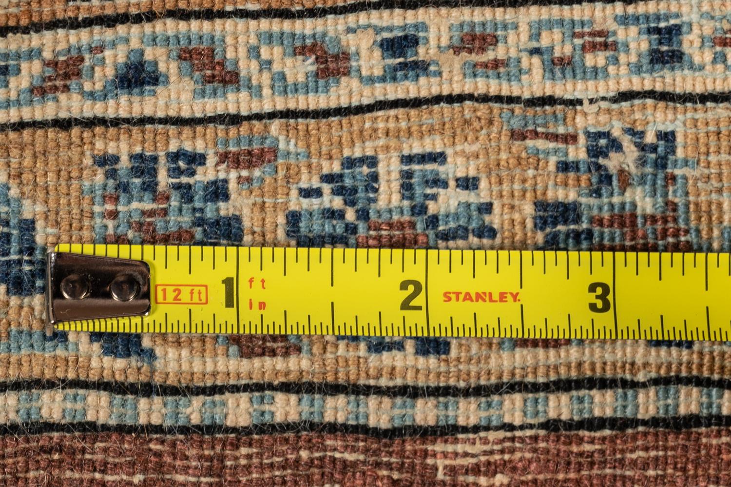 A Tabriz Wool Rug