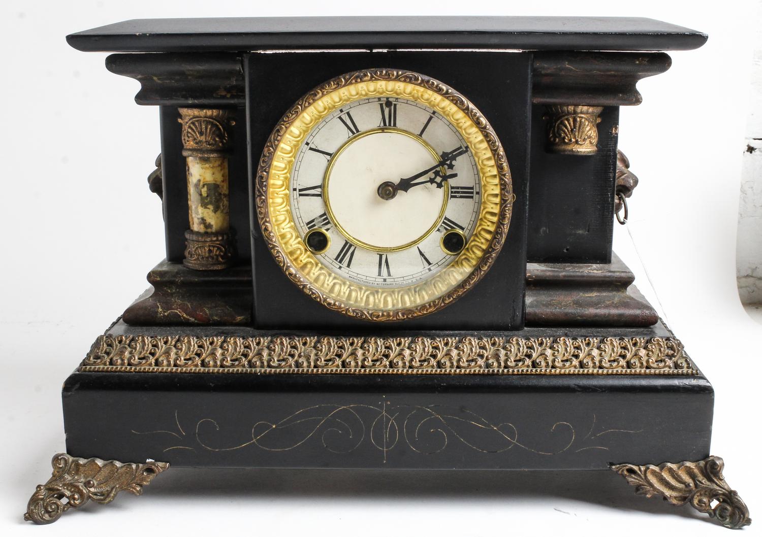 An American Gilt-Metal Mounted and Ebonized Mantel Clock Height 13 x width 18 inches. — 19TH CENTURY