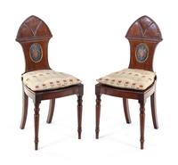 A Pair of Regency Style Mahogany Hall Chairs