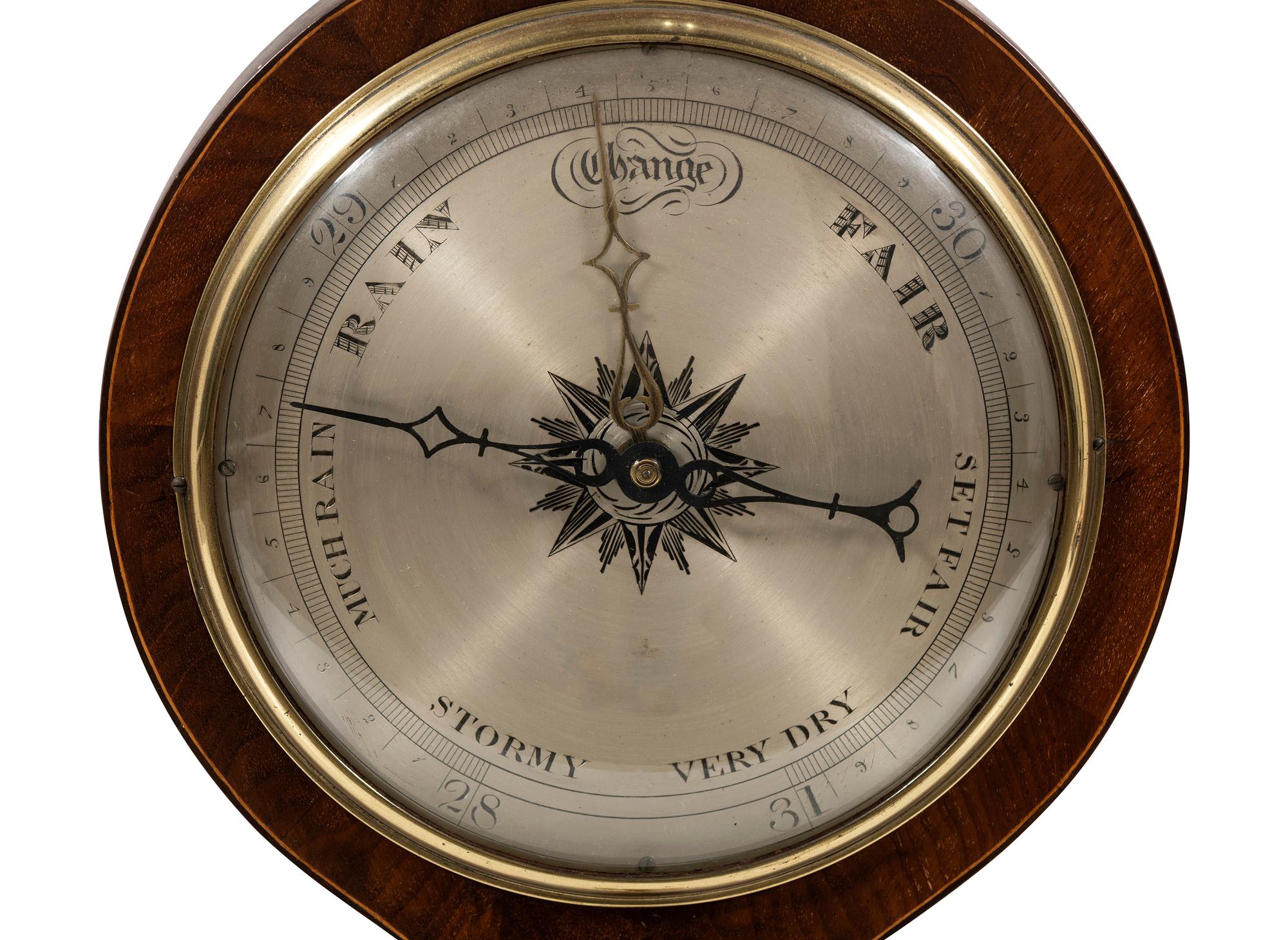 A Regency Mahogany Wheel Barometer
