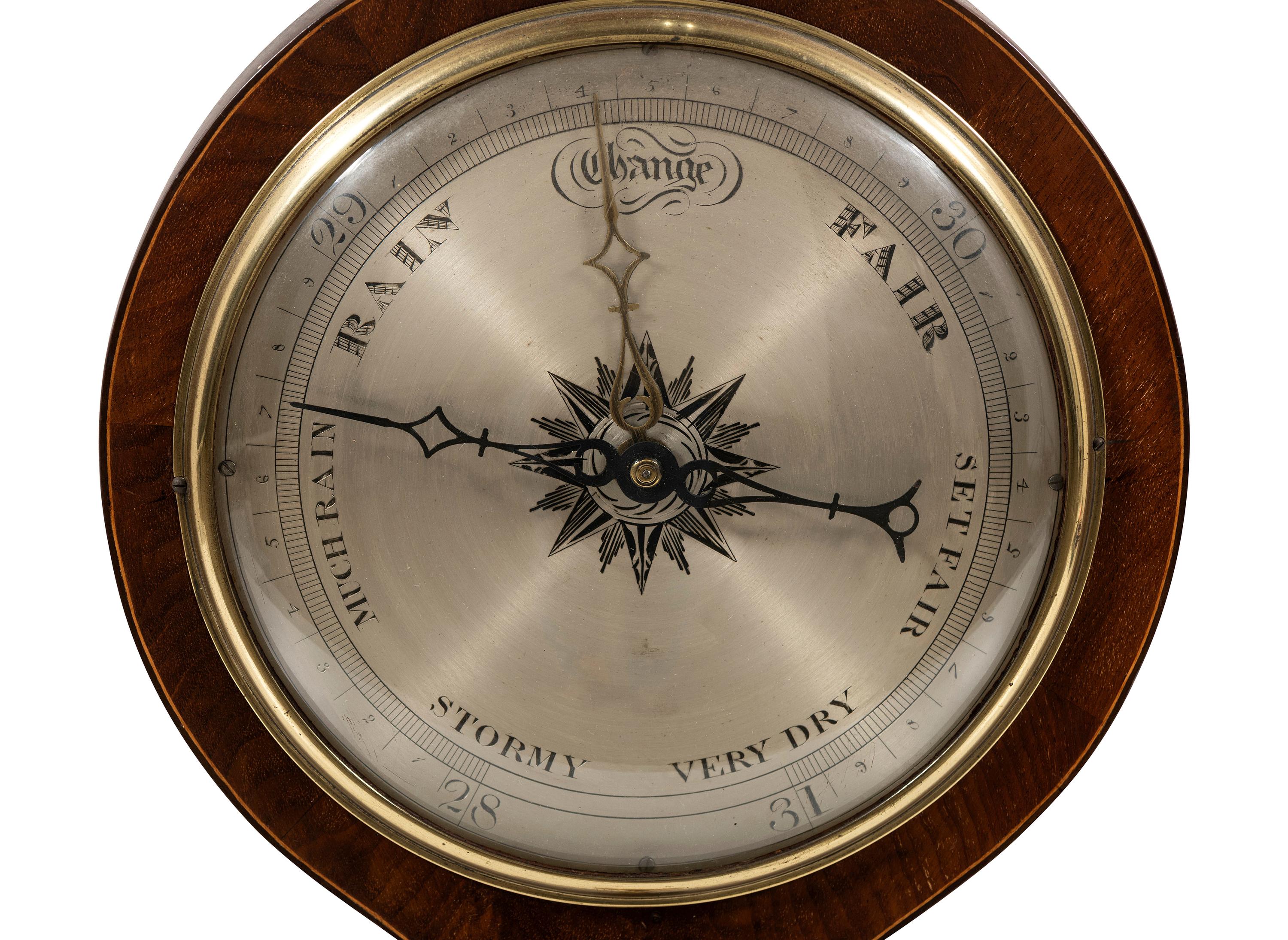 A Regency Mahogany Wheel Barometer