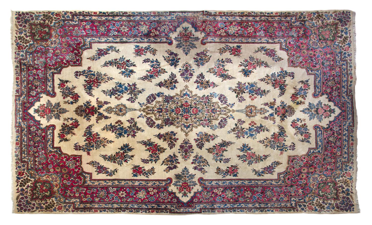 A Kirman Wool Rug 13 feet 10 inches x 9 feet 7 inches. — 20TH CENTURY