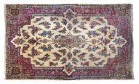 A Kirman Wool Rug 13 feet 10 inches x 9 feet 7 inches. — 20TH CENTURY