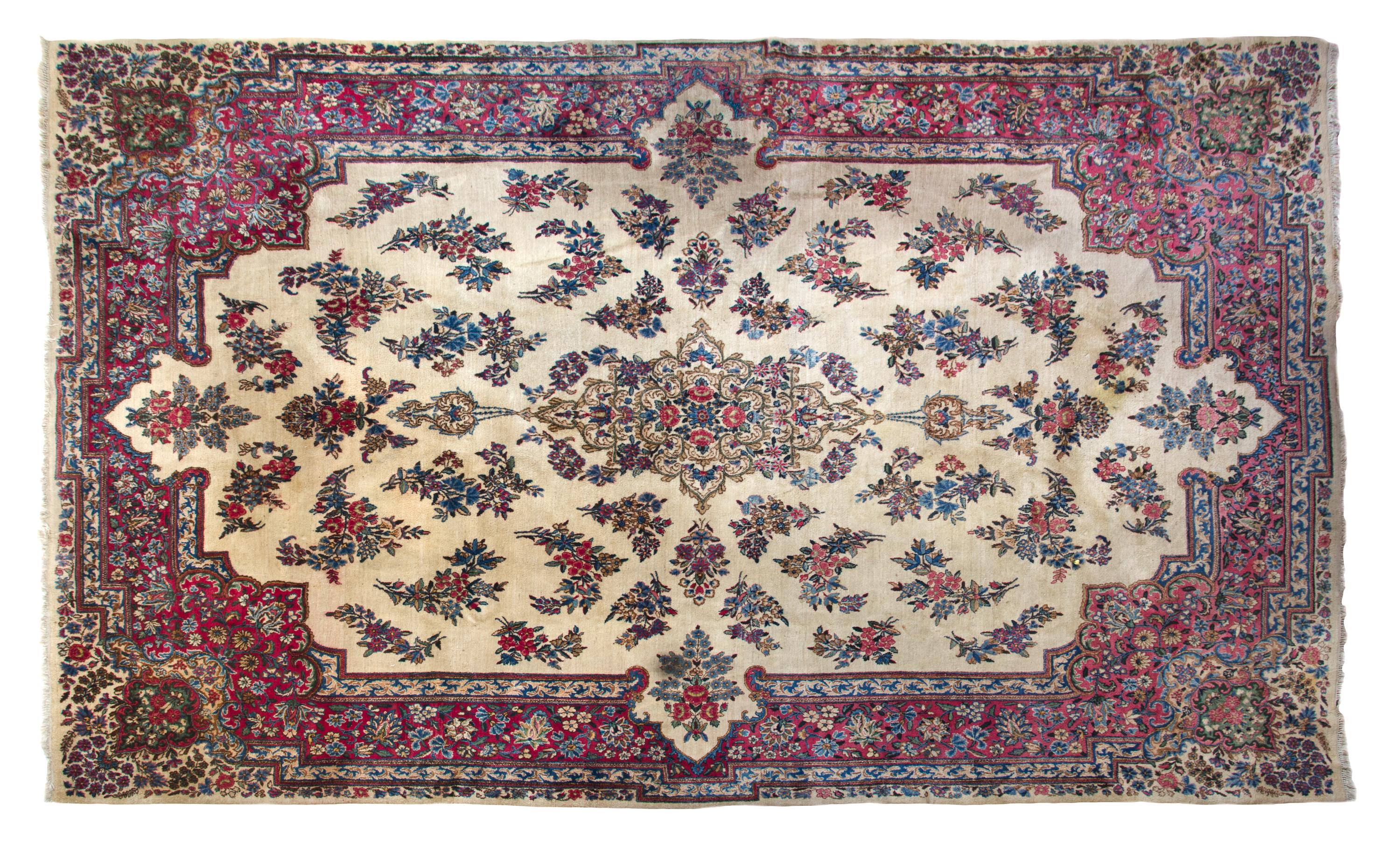 A Kirman Wool Rug 13 feet 10 inches x 9 feet 7 inches. — 20TH CENTURY