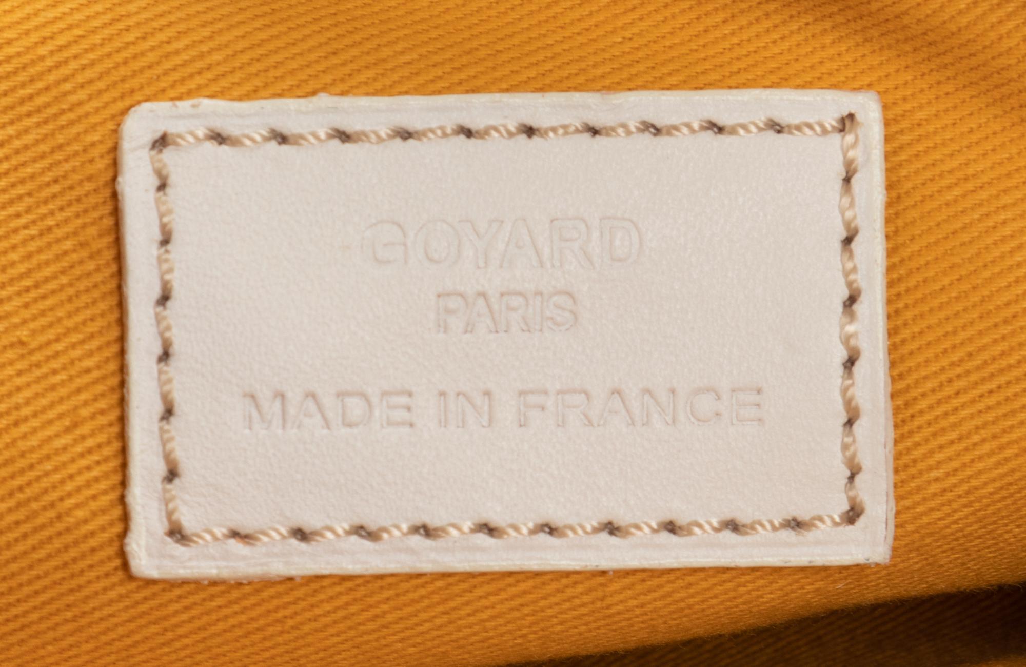 Six Goyard Items: Two Totes, Three Pouches, and One Wallet