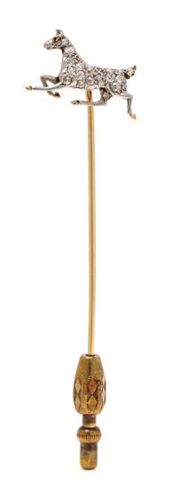 An Edwardian Platinum, Yellow Gold, Diamond and Ruby Horse Motif Stickpin, 2.00 dwts.