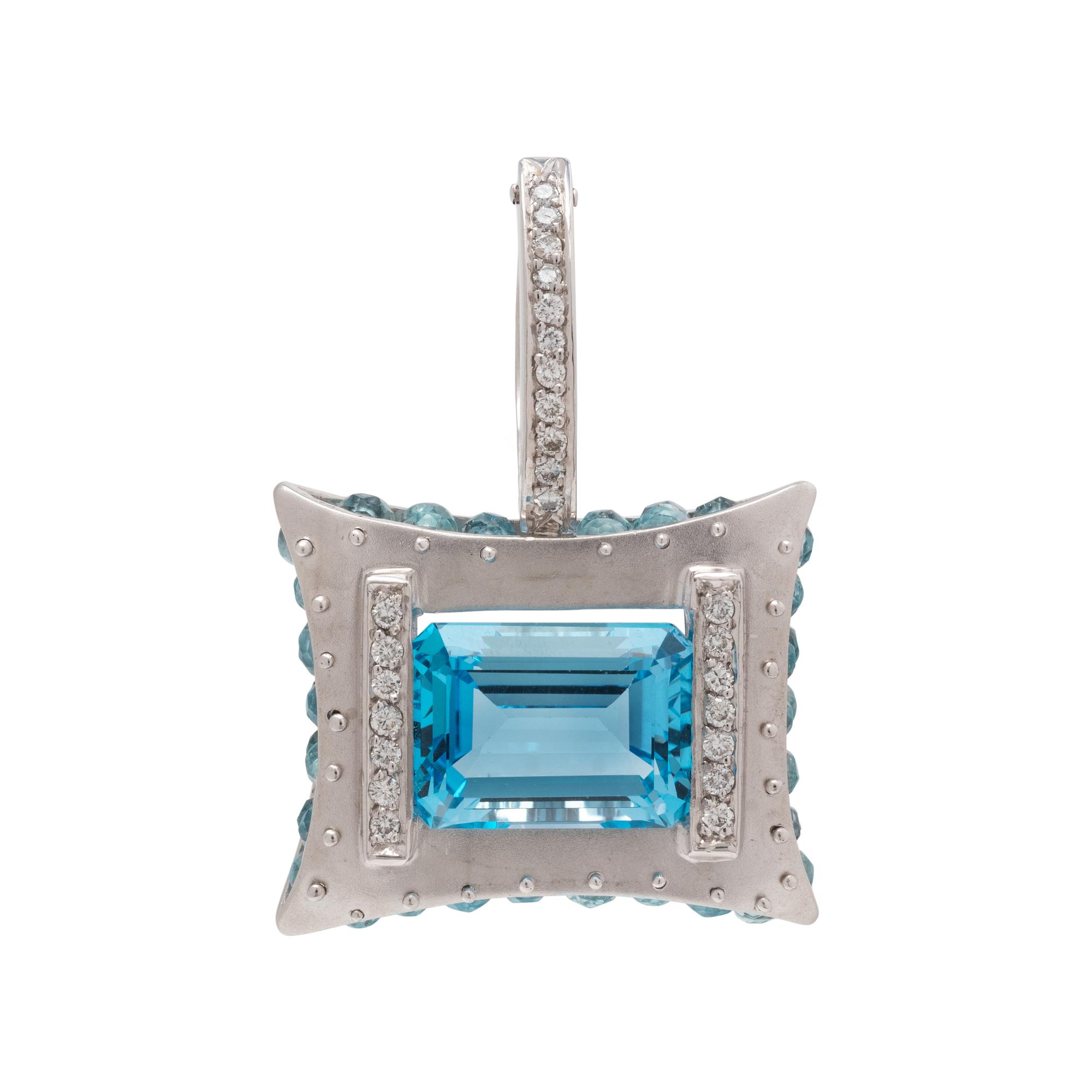 PLATINUM, BLUE TOPAZ AND DIAMOND PENDANT