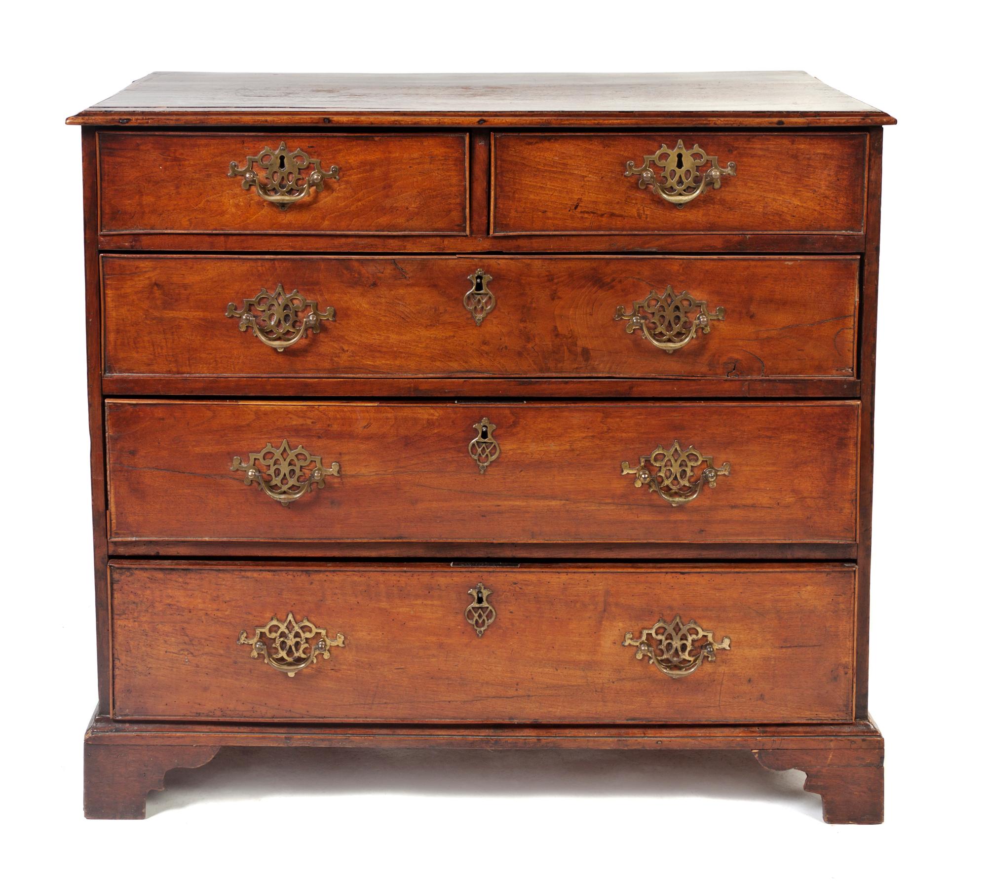 A George III Walnut Chest of Drawers, Height 33 x width 37 x depth 19 3/4 inches.