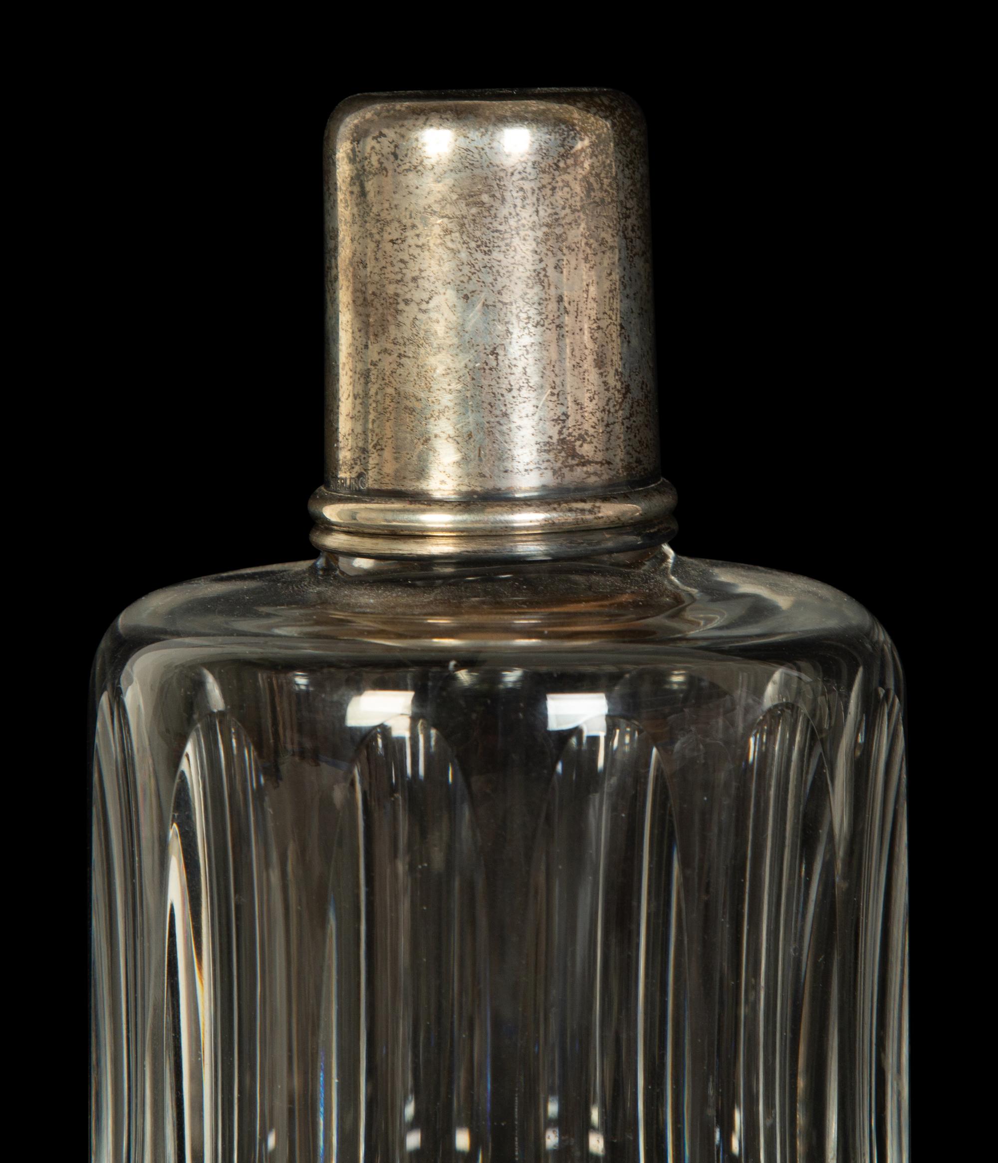 Four American Silver Mounted Cut Glass Decanters