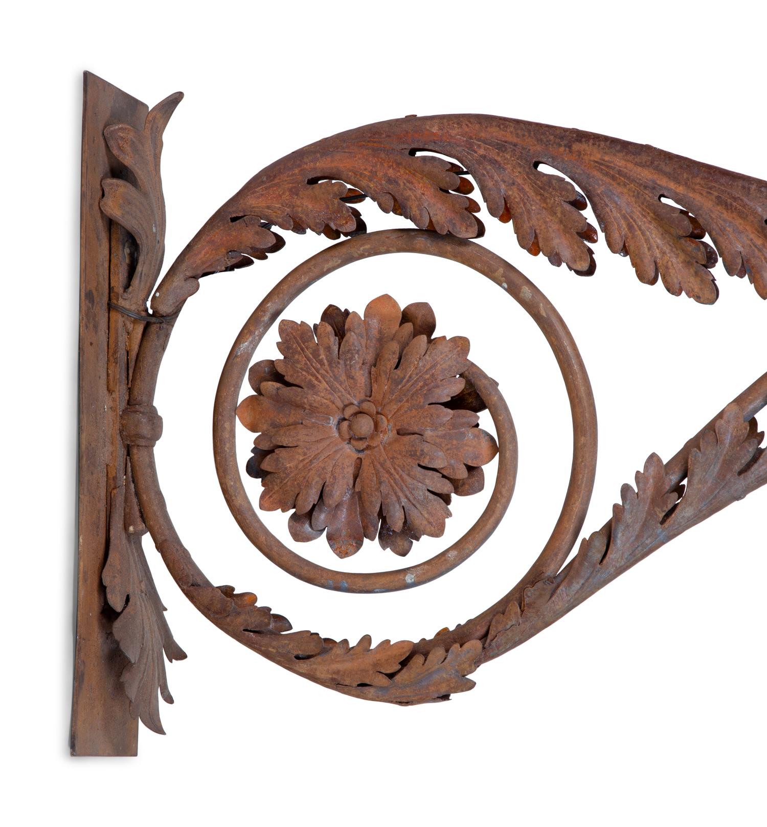 A Pair of Continental Wrought Iron and Tole Sconces