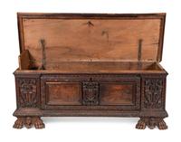 An Italian Carved Walnut Cassone