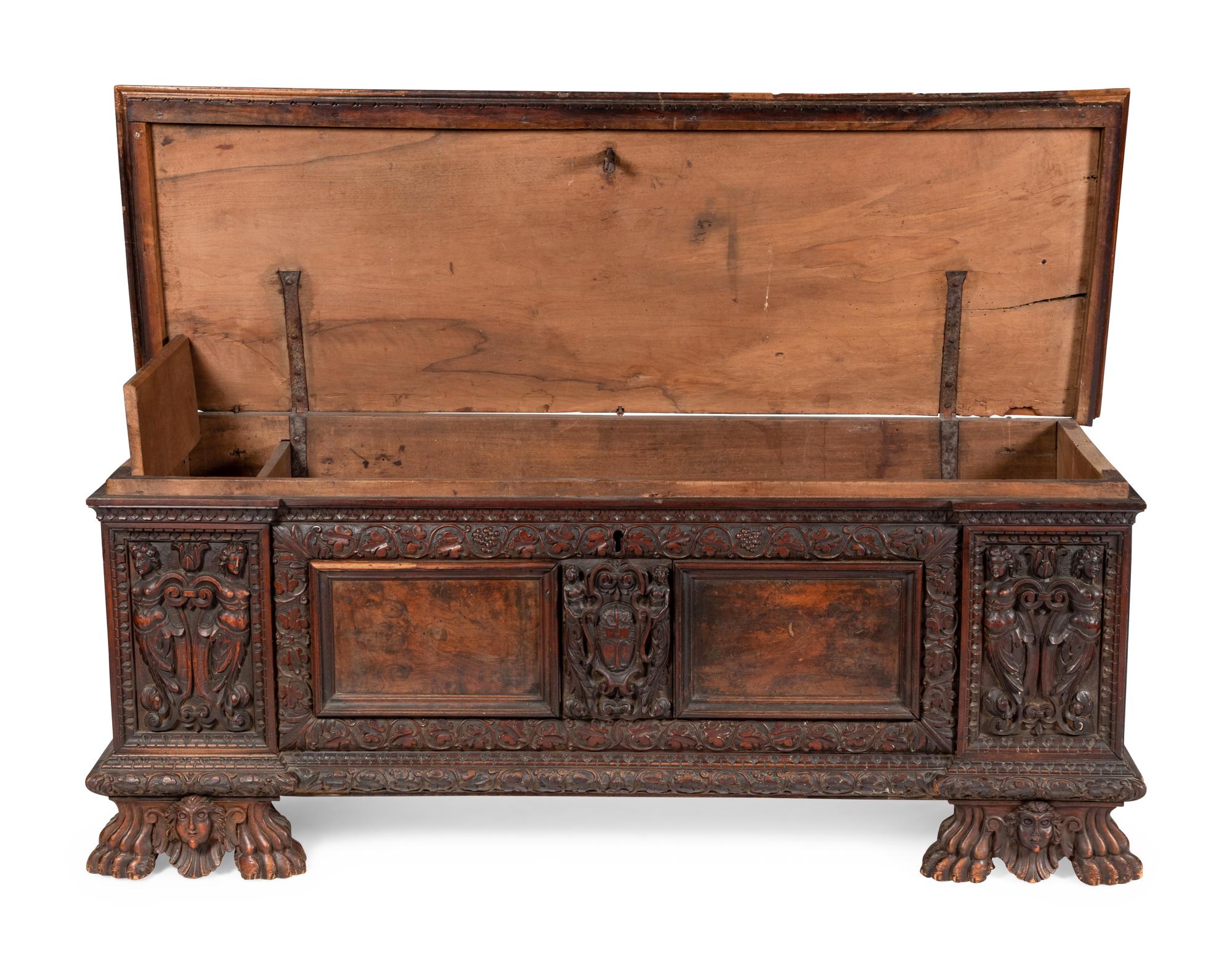 An Italian Carved Walnut Cassone