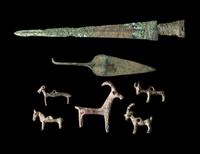 A Group of 7 Luristan Bronze Objects Including Animal Figures and Spearheads