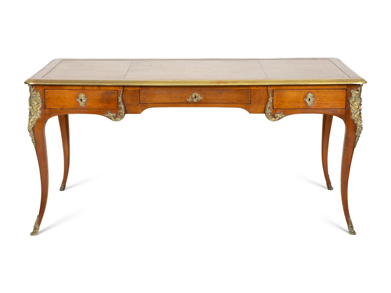 A Louis XV Style Gilt Metal-Mounted Fruitwood Bureau Plat