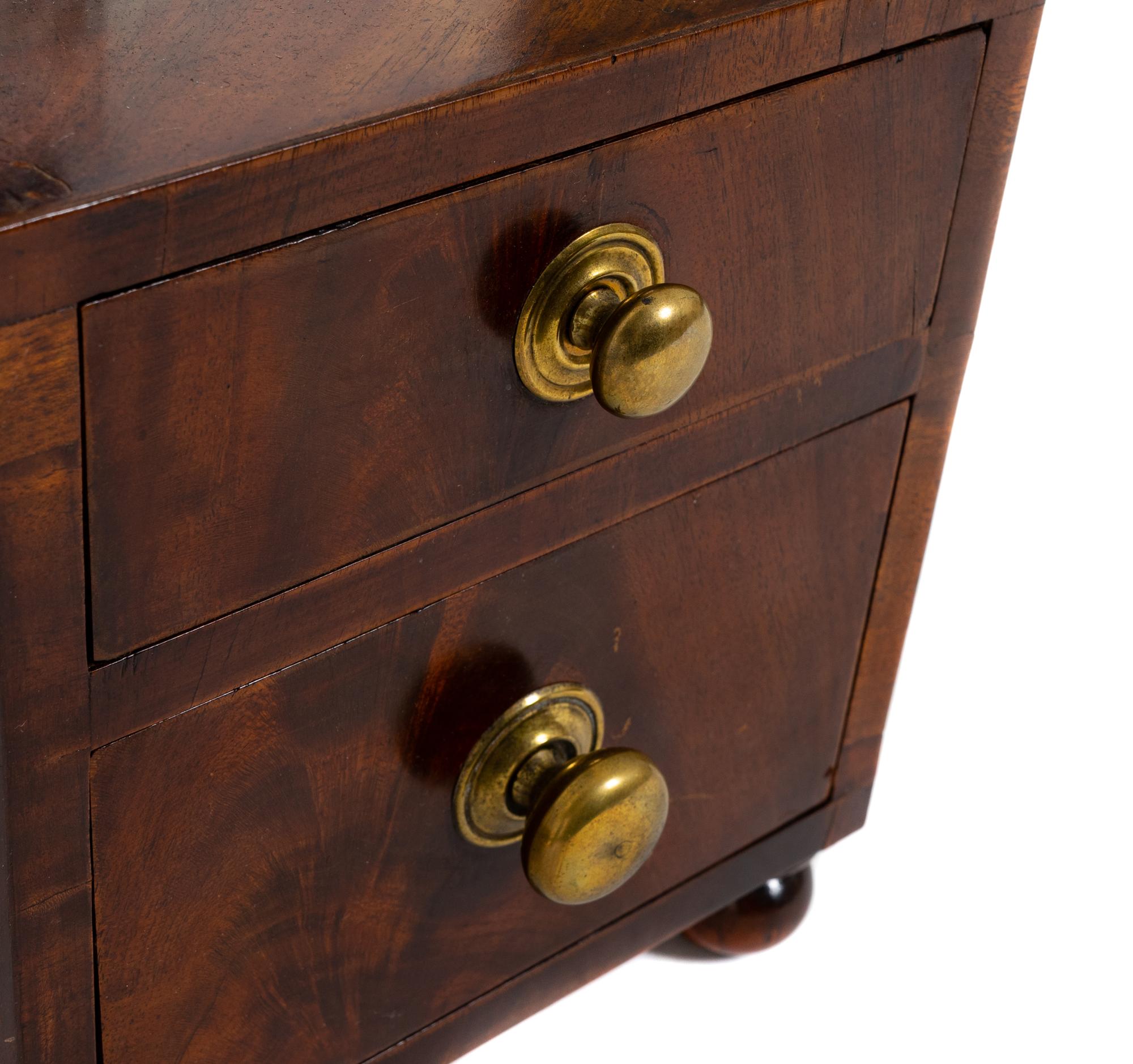 A Regency Crotch Mahogany Shaving Mirror on Stand — EARLY 19TH CENTURY