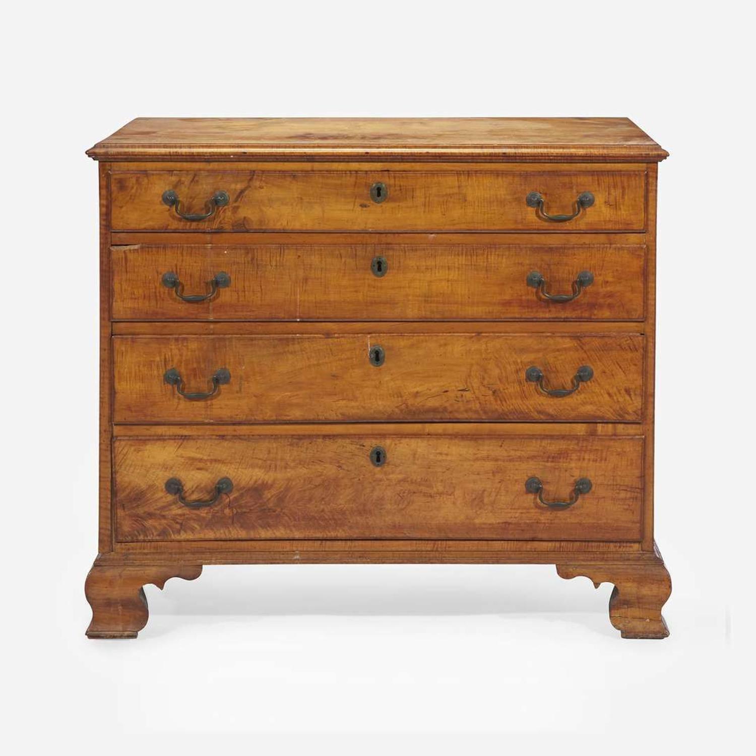 A Chippendale carved tiger maple chest of drawers Pennsylvania, late 18th century