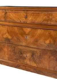 An Italian Walnut Chest of Drawers