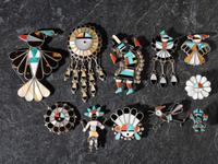 An Assortment of Zuni Mosaic Inlay Pins / Pendants