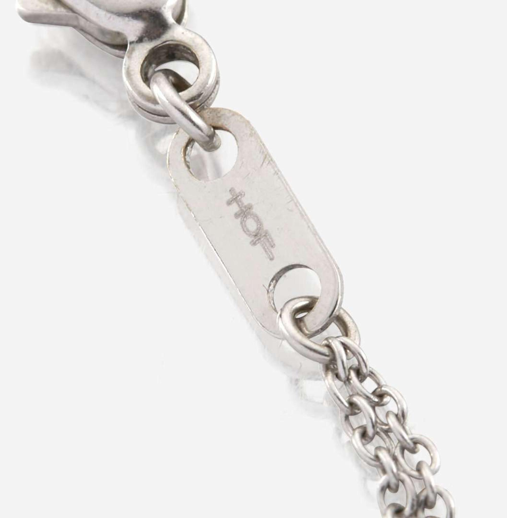 A diamond and white gold pendant, Hearts on Fire