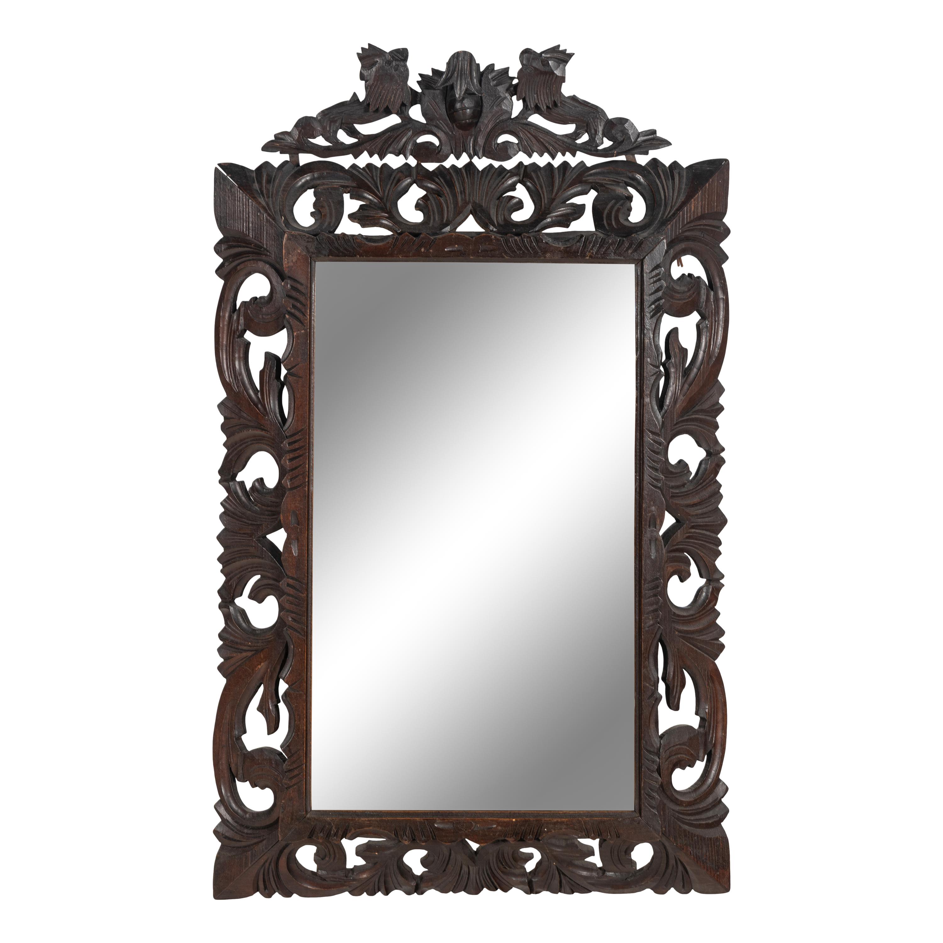 An Italian Carved Oak Mirror