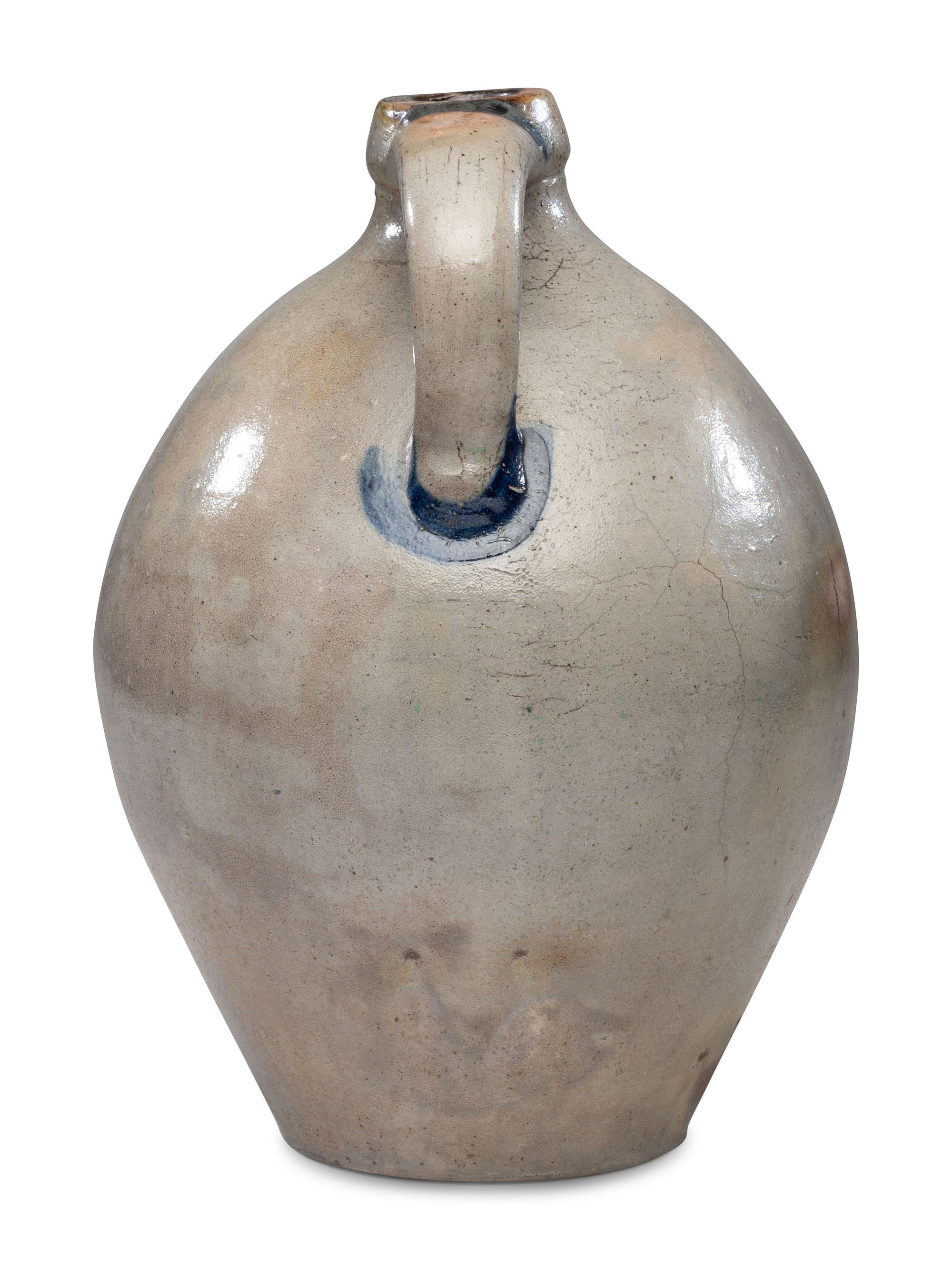 An E.H. Merrill Three-Gallon Stoneware Jug with Applied Eagle