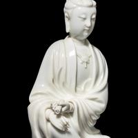 A Chinese Blanc-de-Chine Porcelain Figure of Guanyin, Late Qing/Republic Period 晚清/民國 德化白瓷書卷觀音