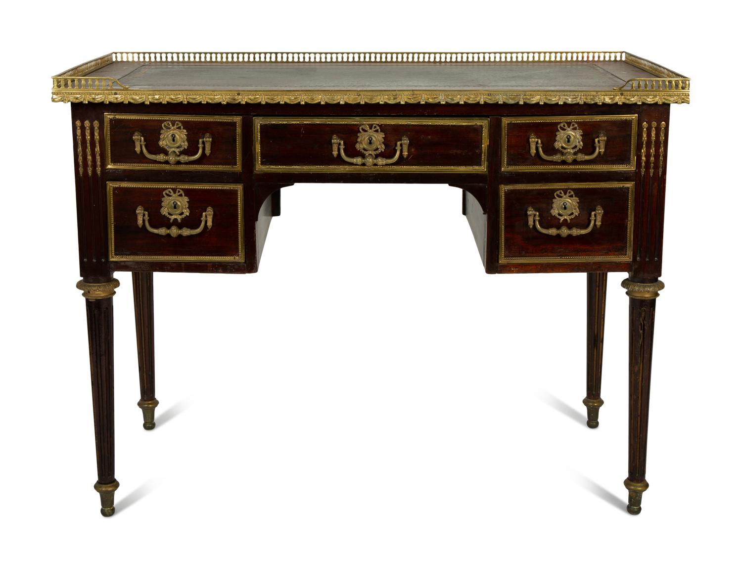 A Louis XVI Style Gilt Bronze Mounted Writing Desk — 19TH/20TH CENTURY