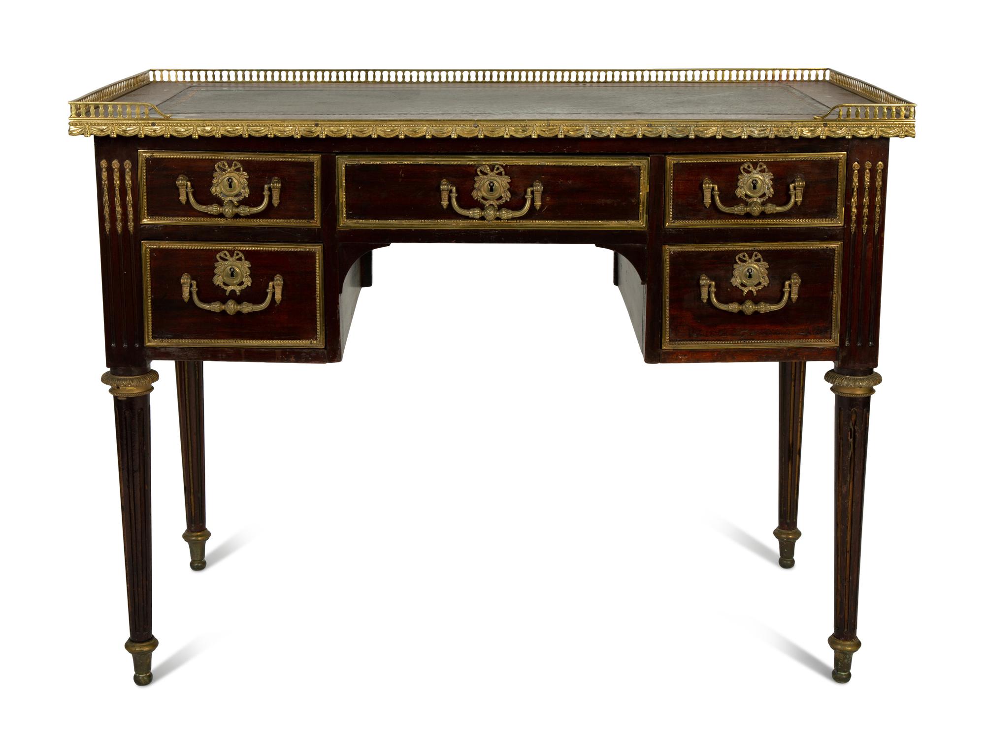 A Louis XVI Style Gilt Bronze Mounted Writing Desk — 19TH/20TH CENTURY
