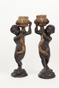 A Pair of Gilt and Patinated Bronze Figures of Cherubs