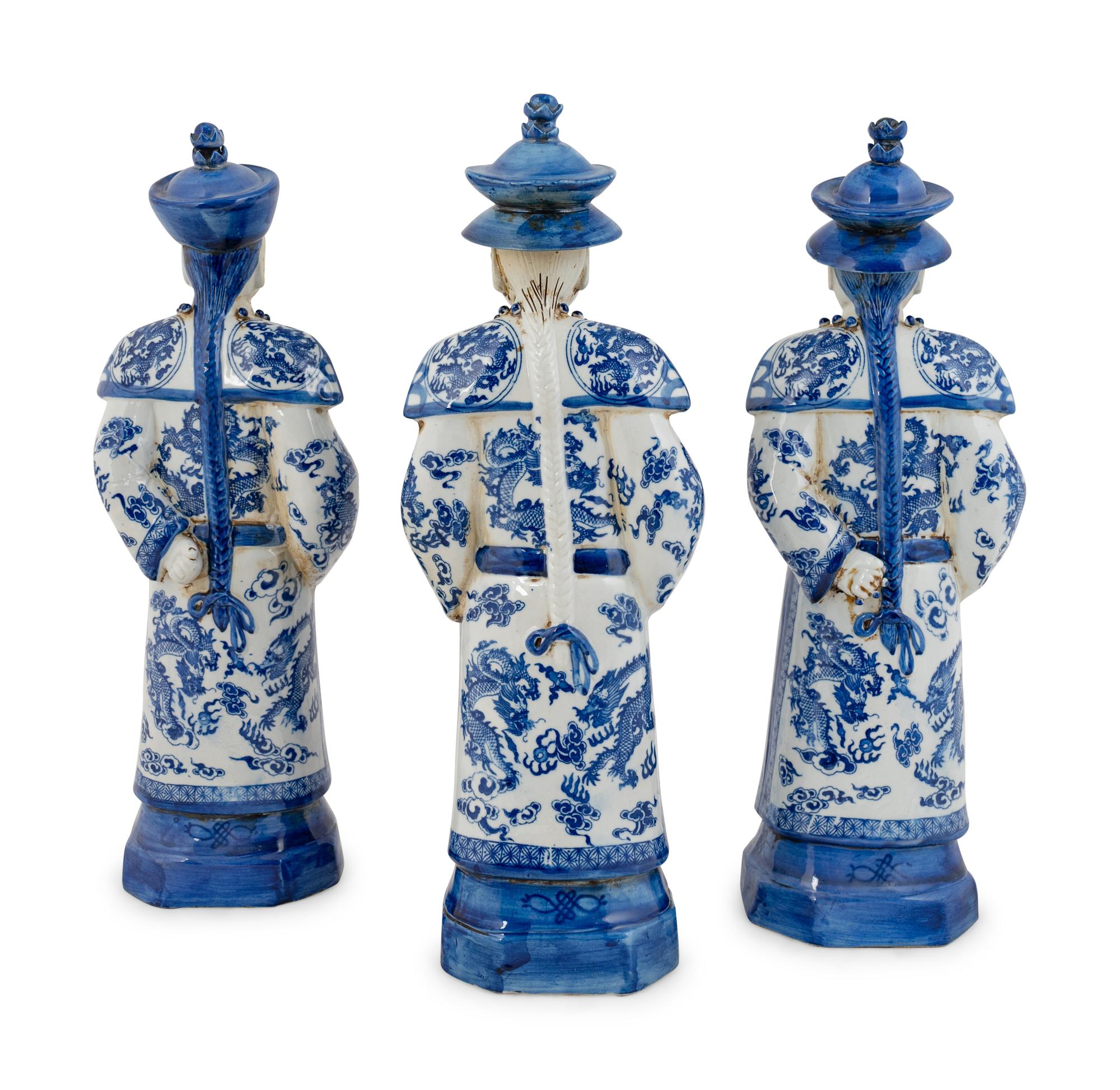 A Group of Three Chinese Blue and White Porcelain Figures of Officials — 20TH CENTURY