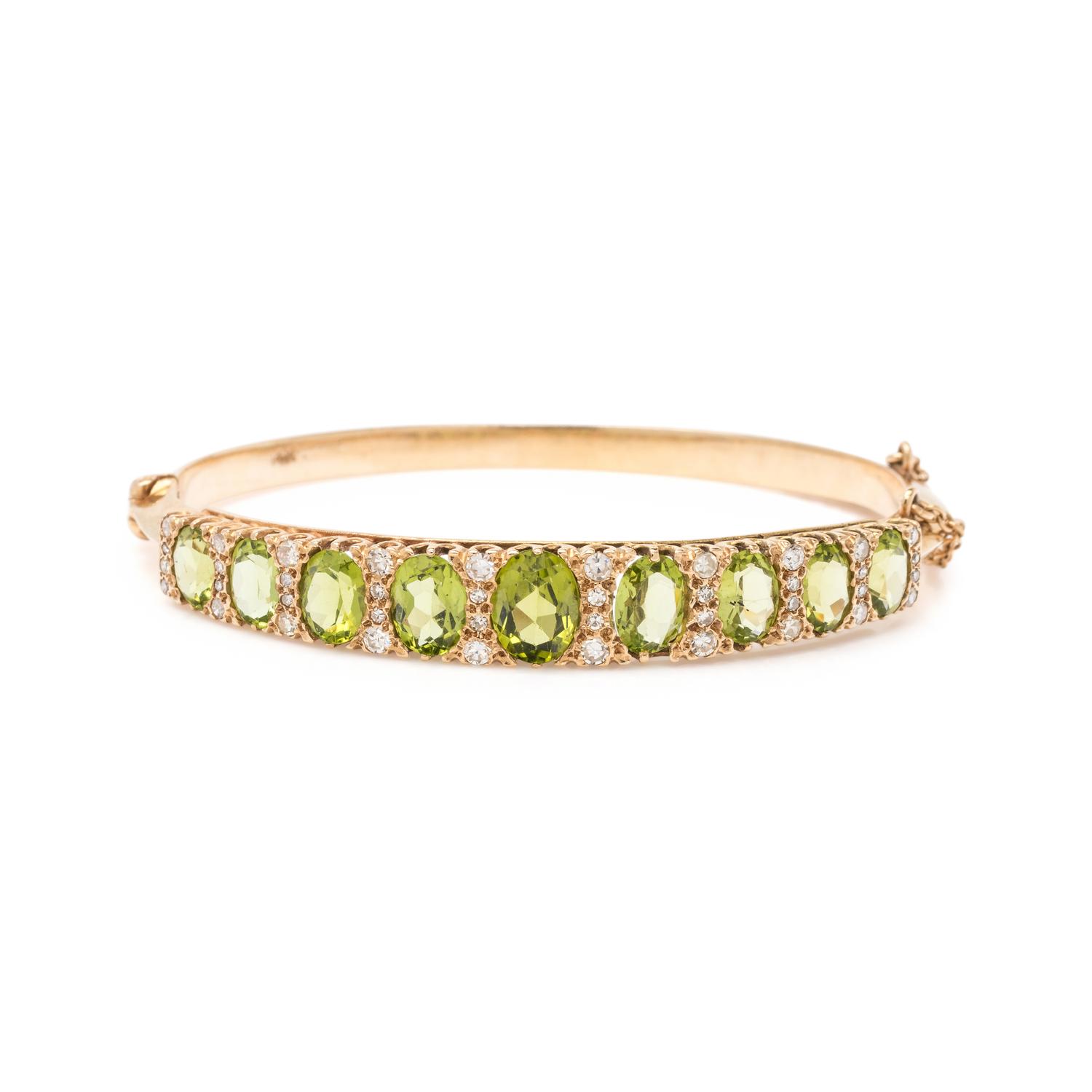 YELLOW GOLD, PERIDOT AND DIAMOND BANGLE BRACELET