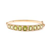 YELLOW GOLD, PERIDOT AND DIAMOND BANGLE BRACELET