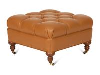 A Regency Style Brown Tufted Leather Upholstered Ottoman
