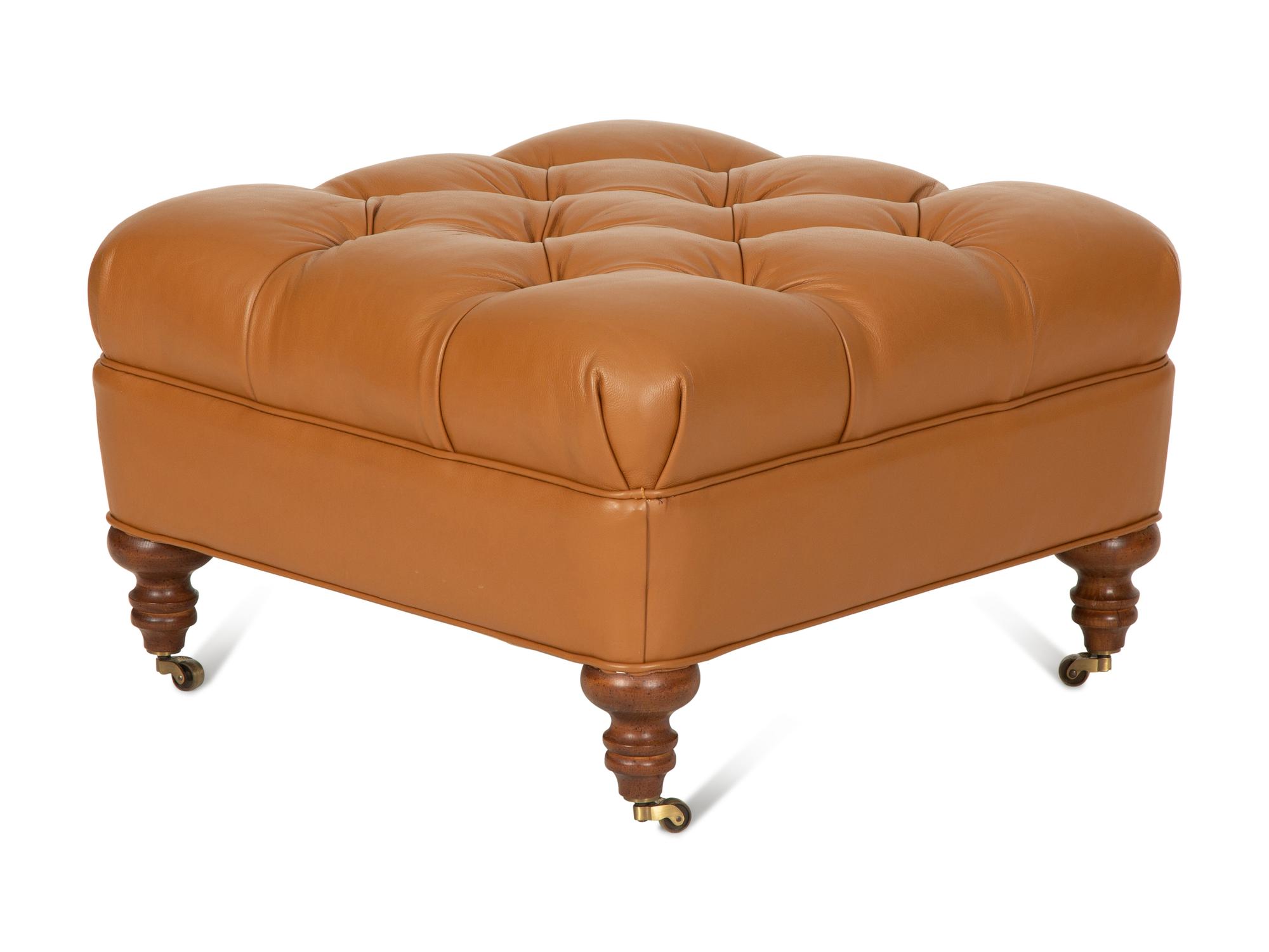 A Regency Style Brown Tufted Leather Upholstered Ottoman