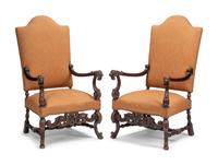 A Pair of William and Mary Style Carved Walnut Armchairs