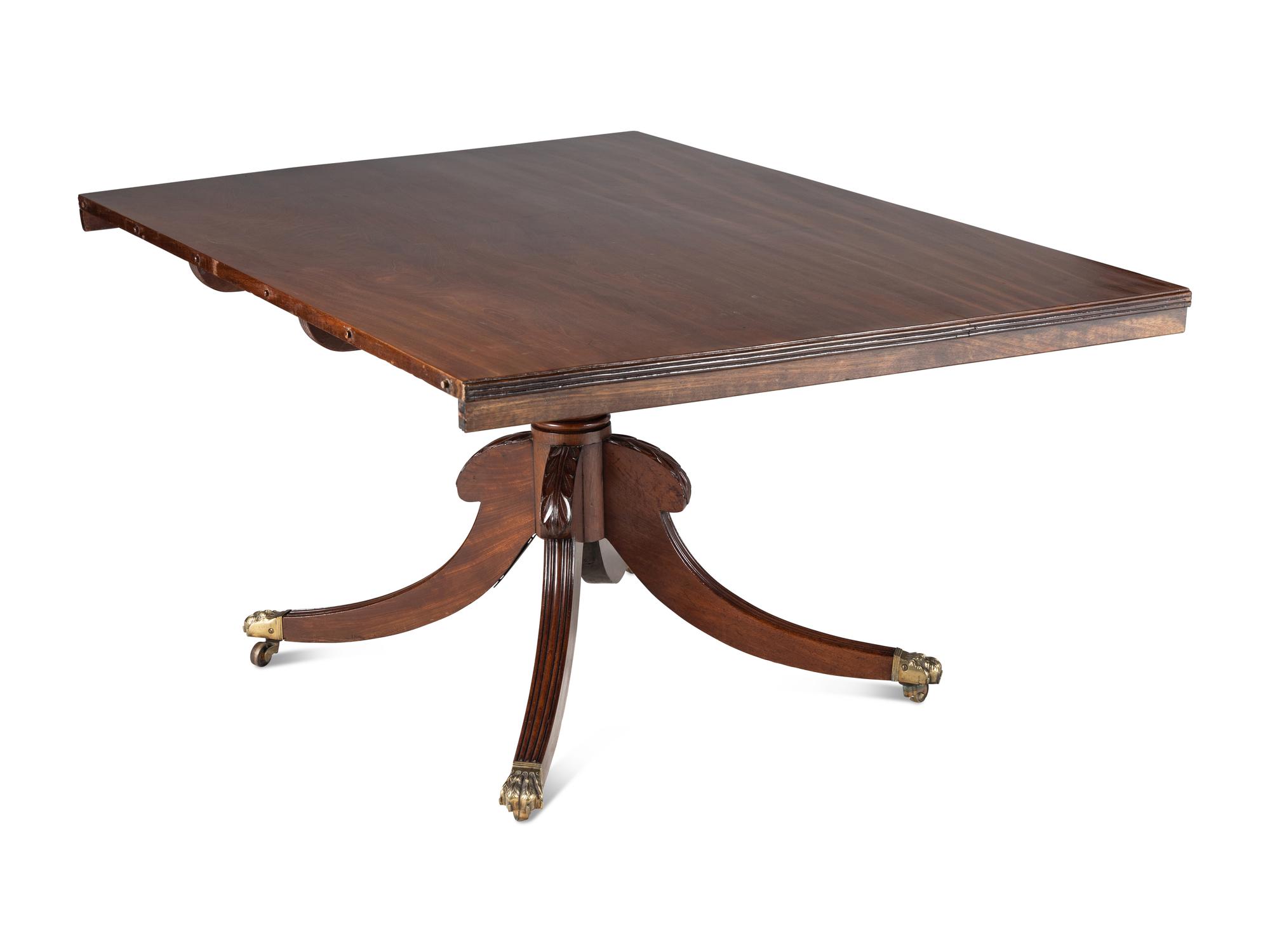 A Regency Style Mahogany Four-Pedestal Dining Table