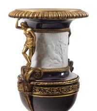 A Pair of French Gilt Bronze Mounted Bisque and Cobalt Glazed Porcelain Urns