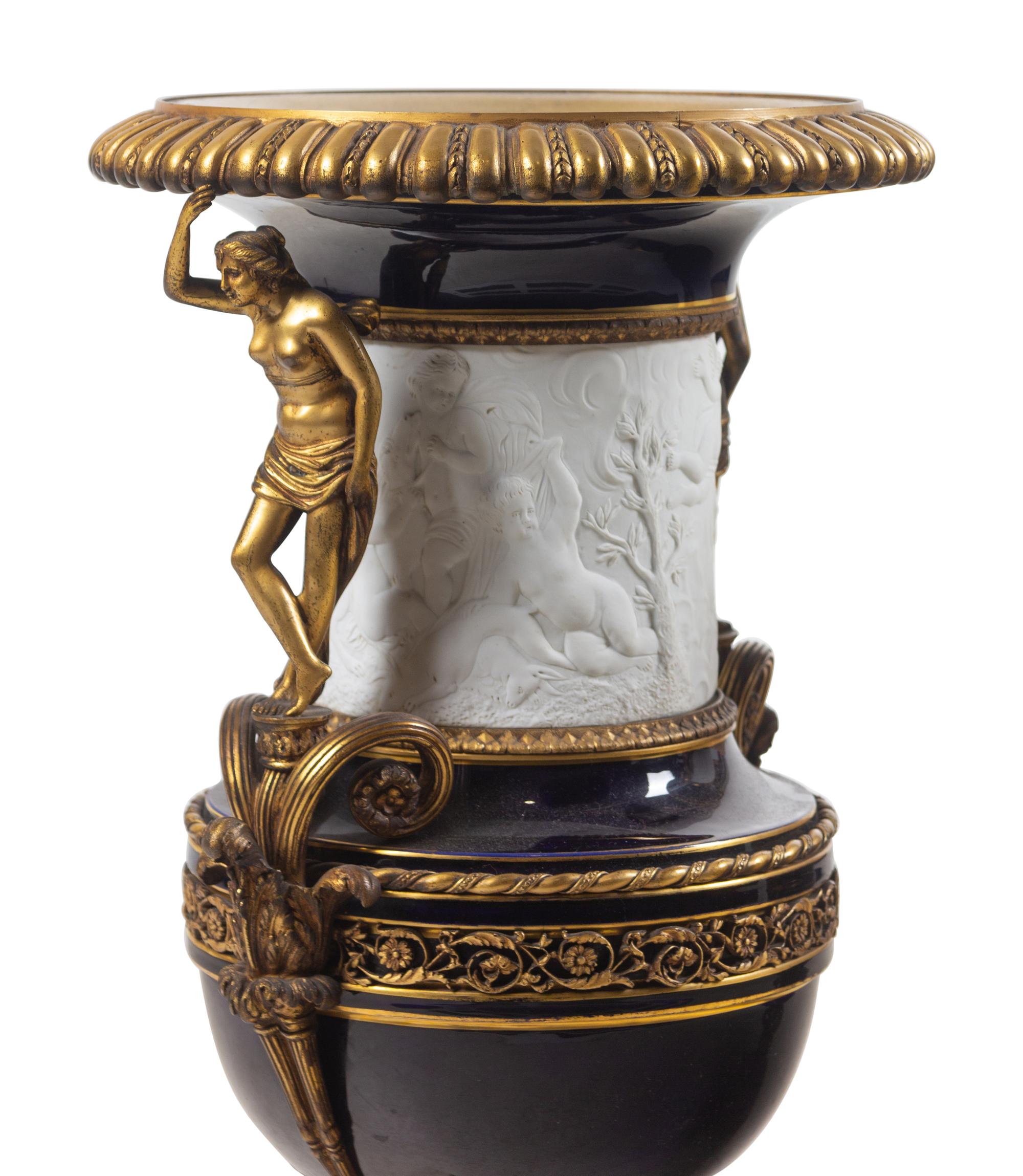 A Pair of French Gilt Bronze Mounted Bisque and Cobalt Glazed Porcelain Urns