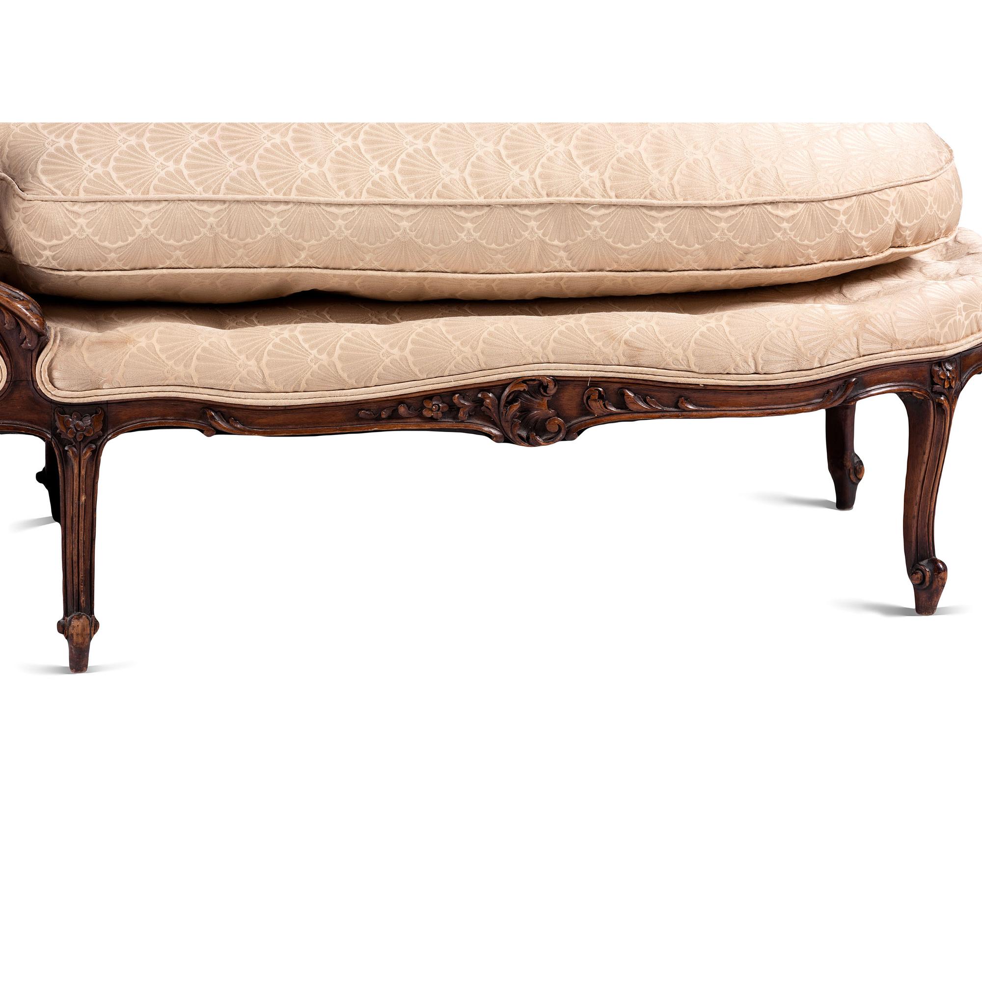 A Louis XV Style Carved Walnut Chaise Lounge