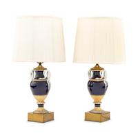 A Pair of Continental Porcelain Vases Mounted as Lamps