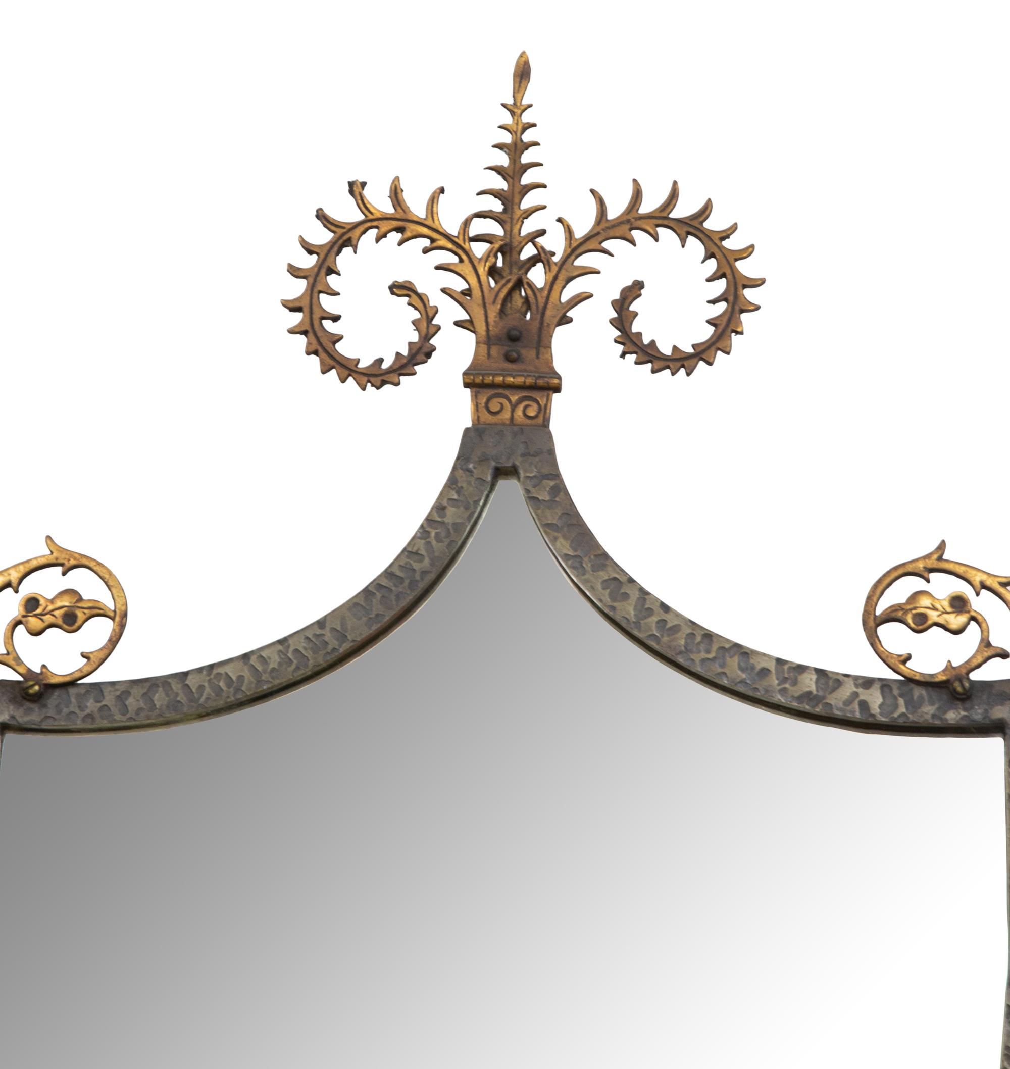 A Continental Brass and Iron Shield-form Mirror