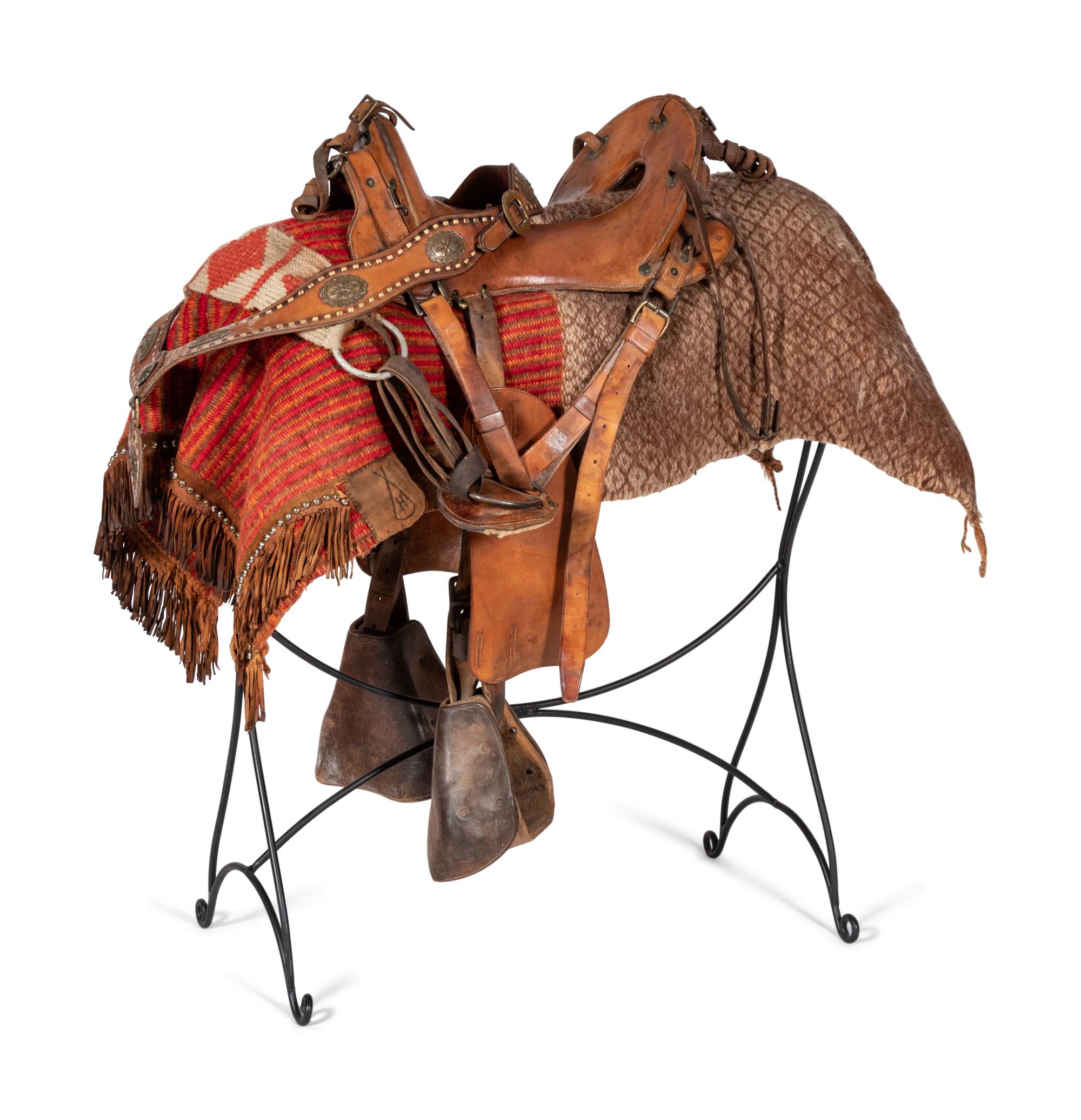 A Tooled Leather and Silver Adorned Parade Saddle