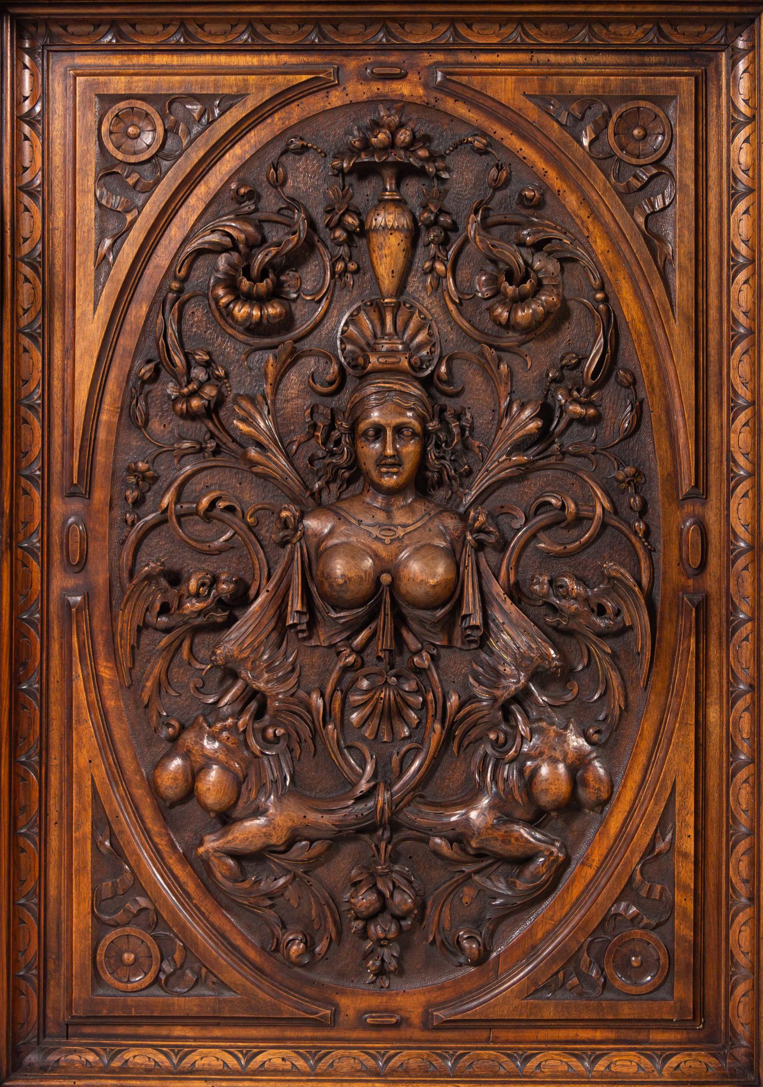 A Pair of Renaissance Revival Carved Walnut Marble-Top Cabinets