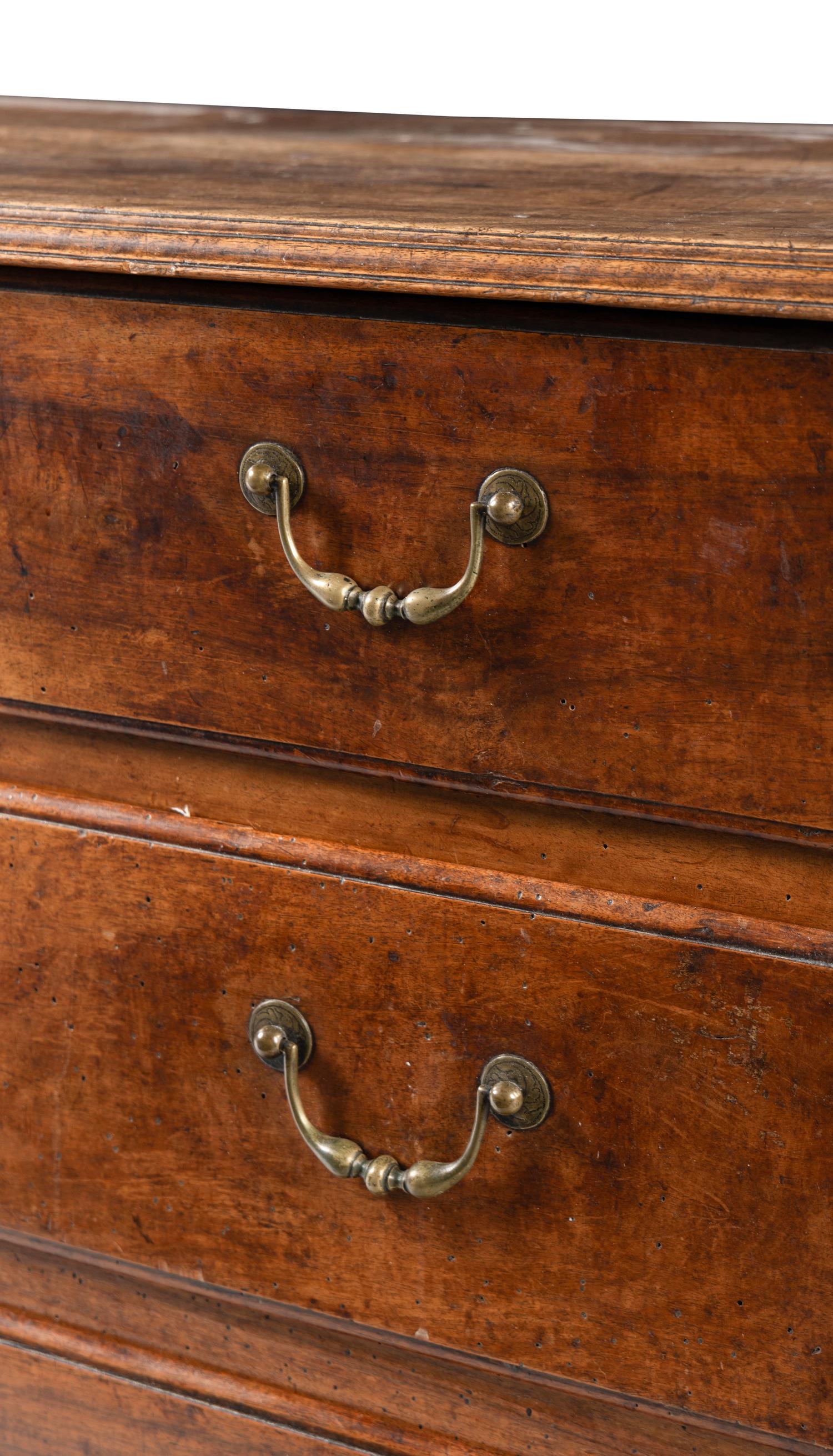 A French Provincial Walnut Chest of Drawers