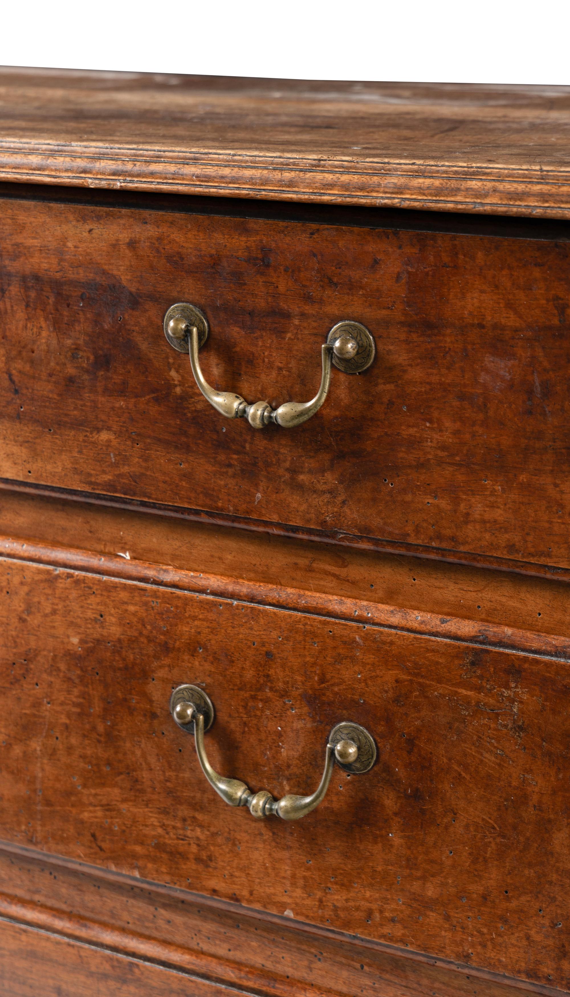 A French Provincial Walnut Chest of Drawers