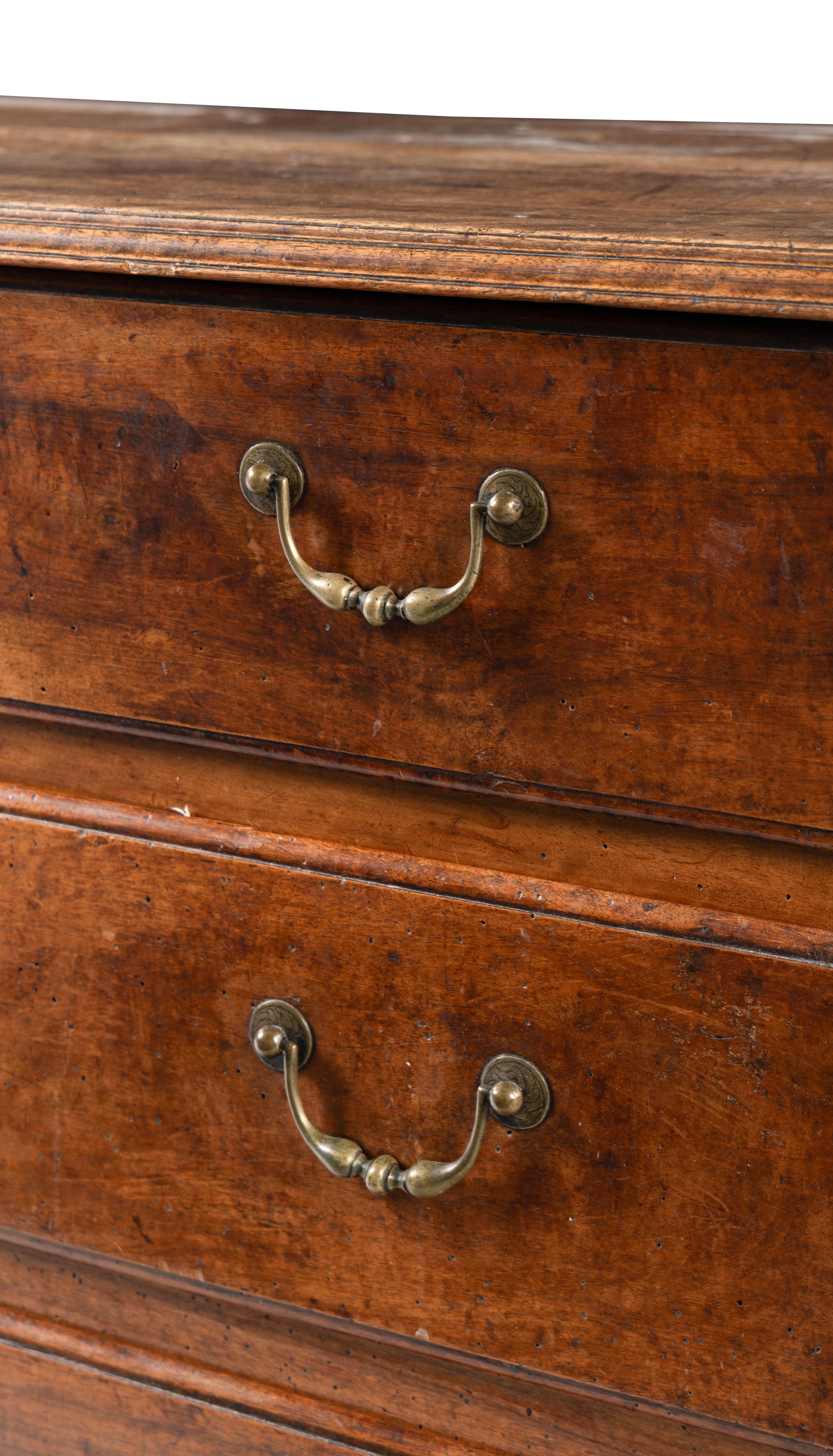 A French Provincial Walnut Chest of Drawers