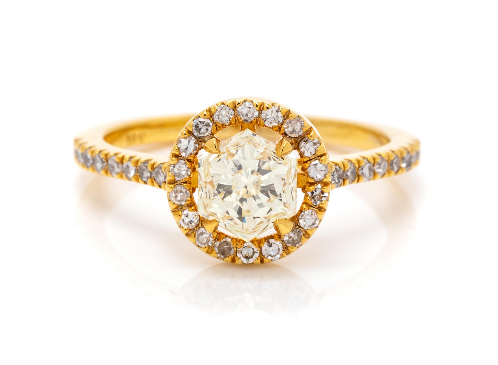 An 18 Karat Yellow Gold and Diamond Ring, 3.00 dwts.