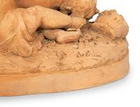 A Continental Terra Cotta Figural Group in the Style of Clodion — 20TH CENTURY